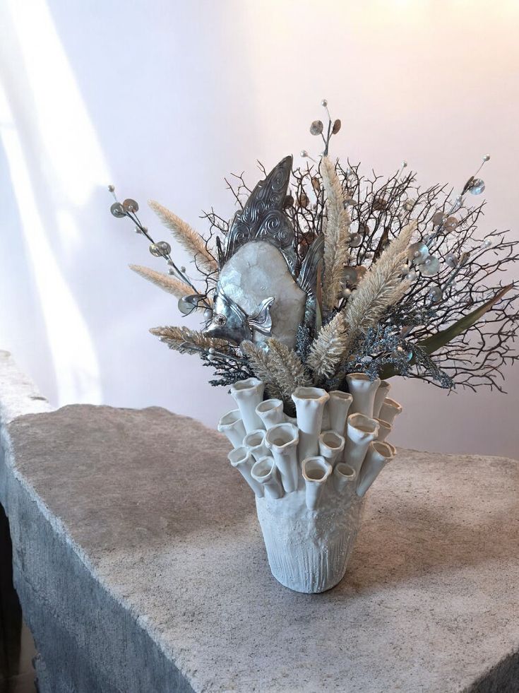 Coral style vase with metal fish and unique coastal design